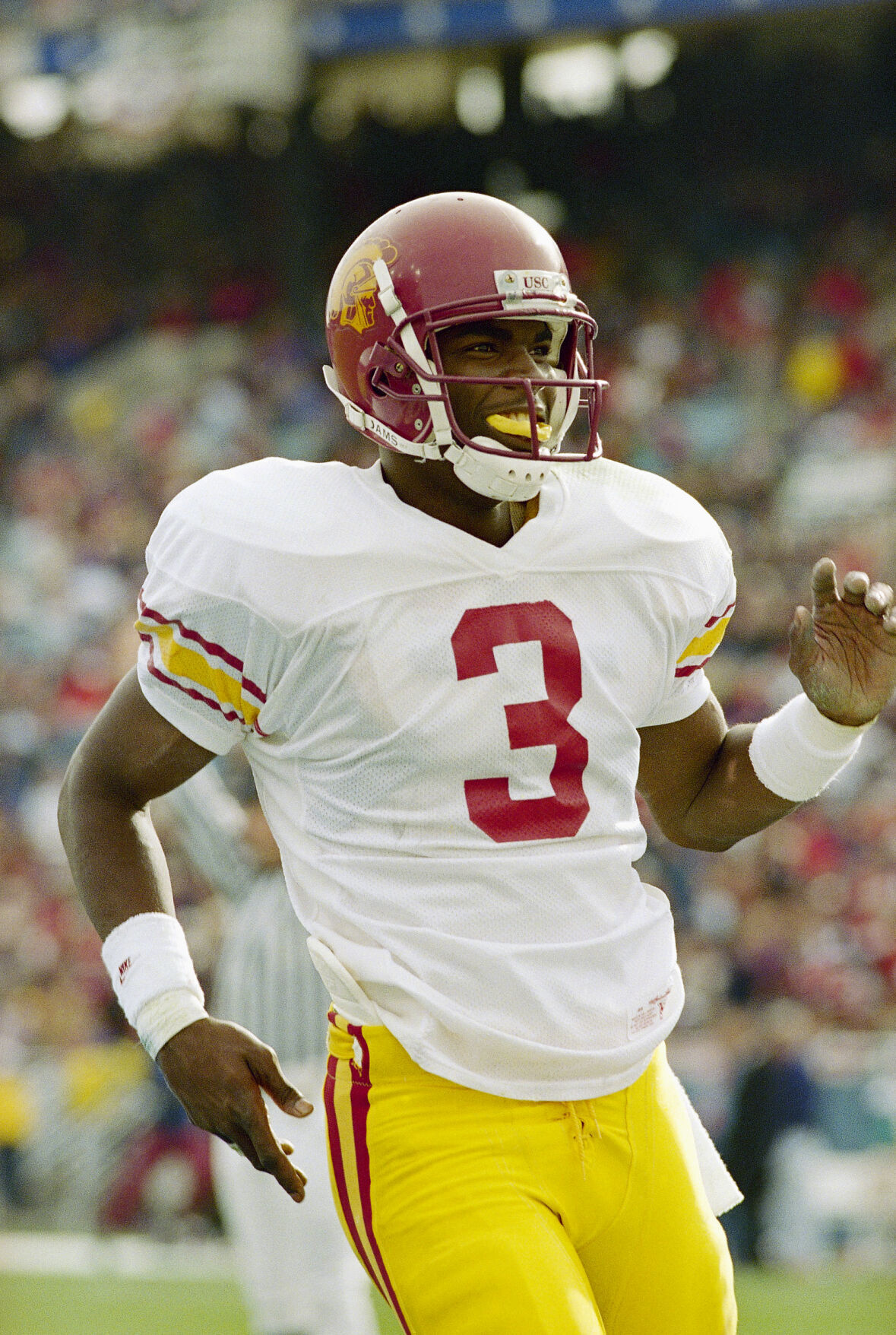 1995: Keyshawn Johnson becomes first NCAA player with 12 straight 100-yard receiving games